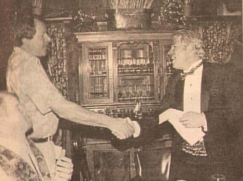 Clifford Mann (left) representing MMSA, gives a check for $5,000 to Dave Harvey Clifford Mann (left) representing MMSA, gives a check for $5,000 to Dave Harvey